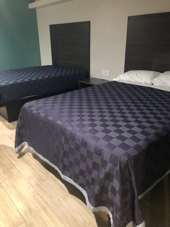 Exclusivo Inn + Suites